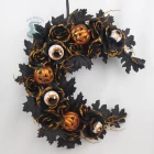 China Senmasine 20Inch halloween front door wreath with black artificial leaf rose pumpkin eyes pattern ball Moon shape wreaths manufacturer