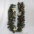 China Senmasine 6ft indoor christmas garlands with poinsettia pinecone artificial pvc mixed pine needle red balls ornaments manufacturer