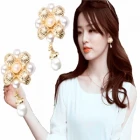 Çin fashion fake gold flower shaped pearl clip on earrings E30044 üretici firma
