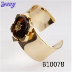 China lotus flower jewelry resin gold cuff alloy bracelet B10078 manufacturer
