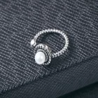 Cina China Supplier single pearl black silver adjustable classic ring for girls produttore