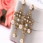 China Personality cross flower earrings European and American big star street shot with the same paragraph jewelry gold drop earrings manufacturer