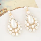 porcelana The new boutique version of the fashionable sweet pearl water droplets temperament earrings wholesale female pearl and diamond earrings fabricante