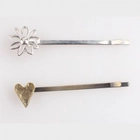 الصين Large metal fashion wholesale crystal flower heart hair clip H50017 الصانع