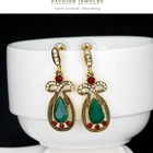 China Famous wholesale fashion small retro earrings for girls diamond multicolor gemstone earrings female manufacturer
