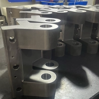 China Integrated CNC milled steel hinge #45# medium carbon steel manufacturer