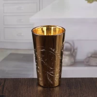 China Embossed gold candlesticks fancy candle holders for sale manufacturer