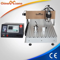 الصين جديد ماخ 3 CNC 6090 راوتر 4 المحور مع DSP المراقب المالي وقوي 2200W المغزل الصانع