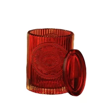 China Bulk patent design oval lotus luxury glass candle jar with lids manufacturer