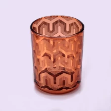 China shiny brown glass candle vessel with laser printing, decorative glass jar for home decor manufacturer