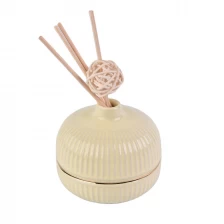 China Wholesales air freshener gold ceramic oil aroma empty reed diffuser bottles manufacturer