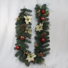China Senmasine 6ft indoor christmas garlands with poinsettia pinecone artificial pvc mixed pine needle red balls ornaments manufacturer