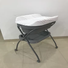 China infant foldable diaper table with wheels and storage baby Convenience changing table with ce manufacturer