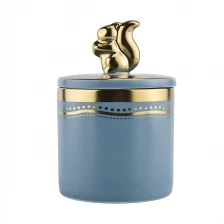 China hot sales blue ceramic candle jar with handing lid manufacturer