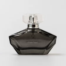 China Luxury Unique Style Custom Logo 50ml Perfume Glass Bottle with Luxury Cap manufacturer