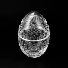 China Creative Egg Shape Embossed Pattern Glass Container 286ml Candle Jar with Lid manufacturer