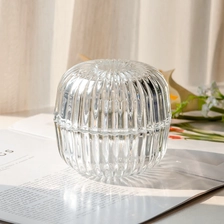 China New Arrival Vertical Stripe Surface Glass Candle Holder with Glass Lid for Scented Candle Filling manufacturer