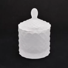 China luxury embossed glass candle jar with lid manufacturer