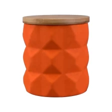 China Customized colored geometric ceramic candle jar with wood lid manufacturer