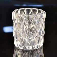 China 8oz unique embossed high-white glass candle holder glass jar for hotel decoration manufacturer