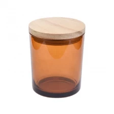 China hot sales 10 oz glass candle jar with wood lid manufacturer