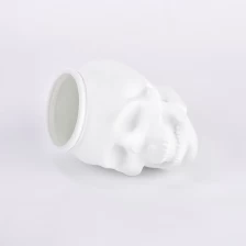 China Unique matte white skull glass candle jar candle vessel manufacturer