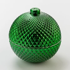 China Decorative Green Round Shape Embossed Glass Wax Candle Jar with Glass Lid manufacturer