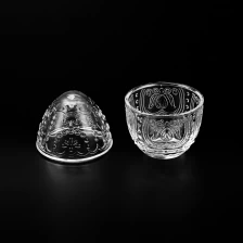 China Wholesale Transparent Shaped Glass Jar with embossed pattern manufacturer