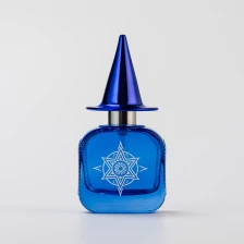 China Home Decor Customize Logo Blue Glass Bottle Perfume Bottle with Blue Lid manufacturer