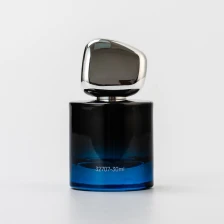 China High-End Dark Blue Customize Logo Glass 30ml Perfume Bottle with Unique Lid manufacturer