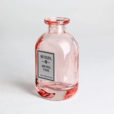 Çin Oblate Flask Pembe Cam Difüzör Şişeleri Etiketli üretici firma