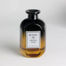 China Oblate Flask Shaped Gradient Yellow to Black Diffuser Bottles manufacturer