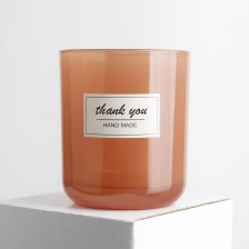 China 8oz 315ml curved bottom translucent amber glass candle vessel with sticker label manufacturer
