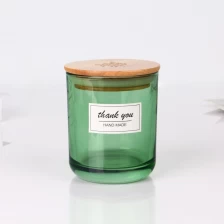 China 8 oz 315ml round bottom transparent green scented candle jar glassware with bamboo wooden lid manufacturer