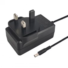 China FCC UK Plug 24W 12V 2A Switching Power Supply Wall Mounted Adapter AC to DC Adapter manufacturer