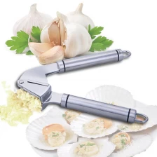 China Kitchen Magic Tool Stainless Steel Garlic Crusher Chopper Peeling Machine Peeler Garlic Press manufacturer