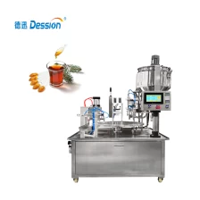 China Automatic Rotary Table Type Mini Honey Spoon Filling Sealing Packing Machine For Packing Honey manufacturer