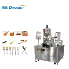 China Fully automatic liquid honey spoon filling machine - 2000 packs/hour high-speed filling and sealing manufacturer