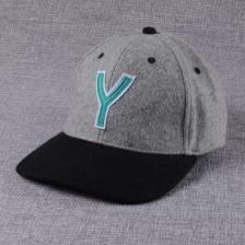 China laser cutting logo melton wool baseball caps manufacturer