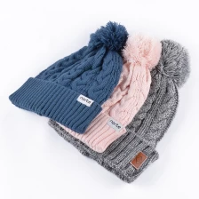 China plain pom pom winter beanies knitted hats custom manufacturer