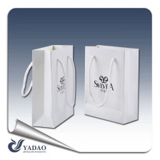 porcelana 2017 nuevos productos nueva tendencia diseño simple estilo bolsa de papel bolsa de regalo bolsa de mano bolsa de compras proveedor China Yadao fabricante