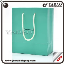 China Beautiful blue paper jewelry bag for shopping bags manufacturer
