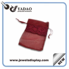 Cina Bella popolare caldo-vendita trasparente merletto di formato personalizzato e colore buona occhiata sacchetto di seta per l'imballaggio gioielli produttore