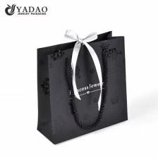 China Black fashion shopping paper packaging bag for jewelry and watch packing with free logo and color customized manufacturer