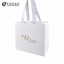 الصين CMYK printing custom size/color/logo shopping/gift/jewelry packaging paper bag with ribbon handle الصانع