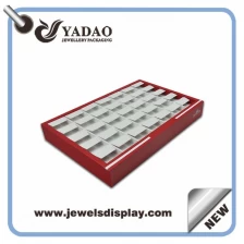 China Chinese Manufacturer of promotional handmade white and red leather earring display trays ,earring exhibitor tray holder , earring presentation trays manufacturer