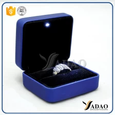 China Chinese handmade pu leather cover LED light jewelry box metal ring box with LED in manufacturer