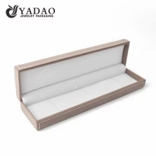 China Custom made classic and elegant plastic bracelet box covered with yangbuck, with neat stiching and logo printing. manufacturer
