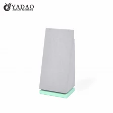 China Customize wooden standing jewelry display stand necklace display holder slant hollow design to hide chains manufacturer