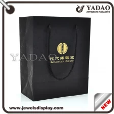 China Customized black paper jewelry bag for jewelry store go shopping bag manufacturer
